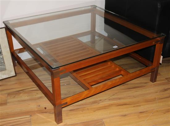 A glass top coffee table, by Pierre Van Del of Paris, W.101cm